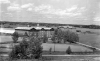 Later view of both the boys' school, in the foreground, and the girls' school behind.