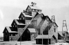 Early 1900's - The original structure as it appeared prior to construction of the newer headframe.