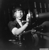 May 26, 1942 - Machinist wearing a protective face mask.  Photo courtesy Library and Archives Canada.