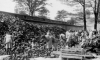 Date unknown - Prisoners of Kanadakommando sorting through belongings confiscated from victims.